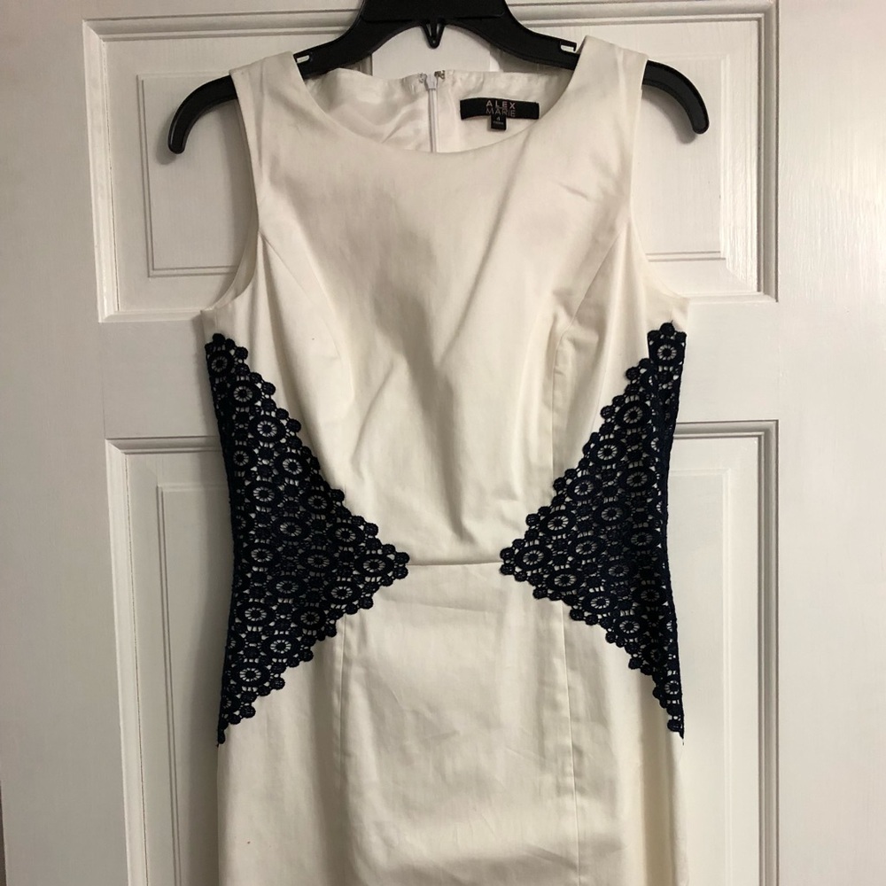 New white professional dress with navy trim
